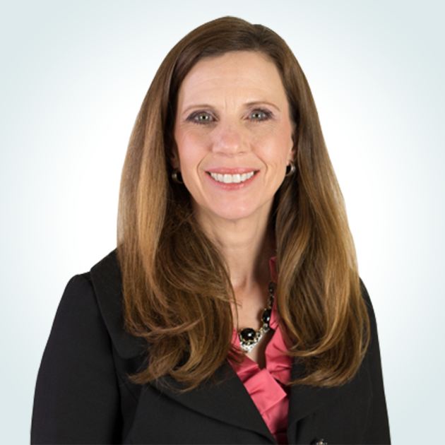 Janet E. Vogini